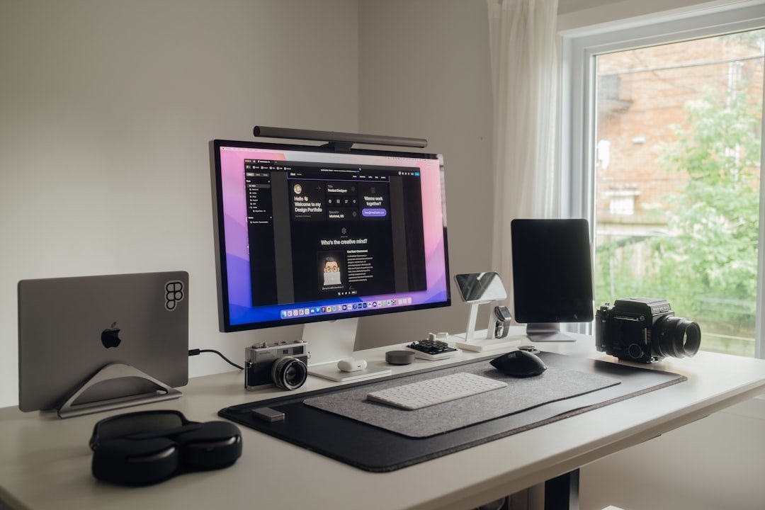 Desktop computer on a white desk in a clean workspace
